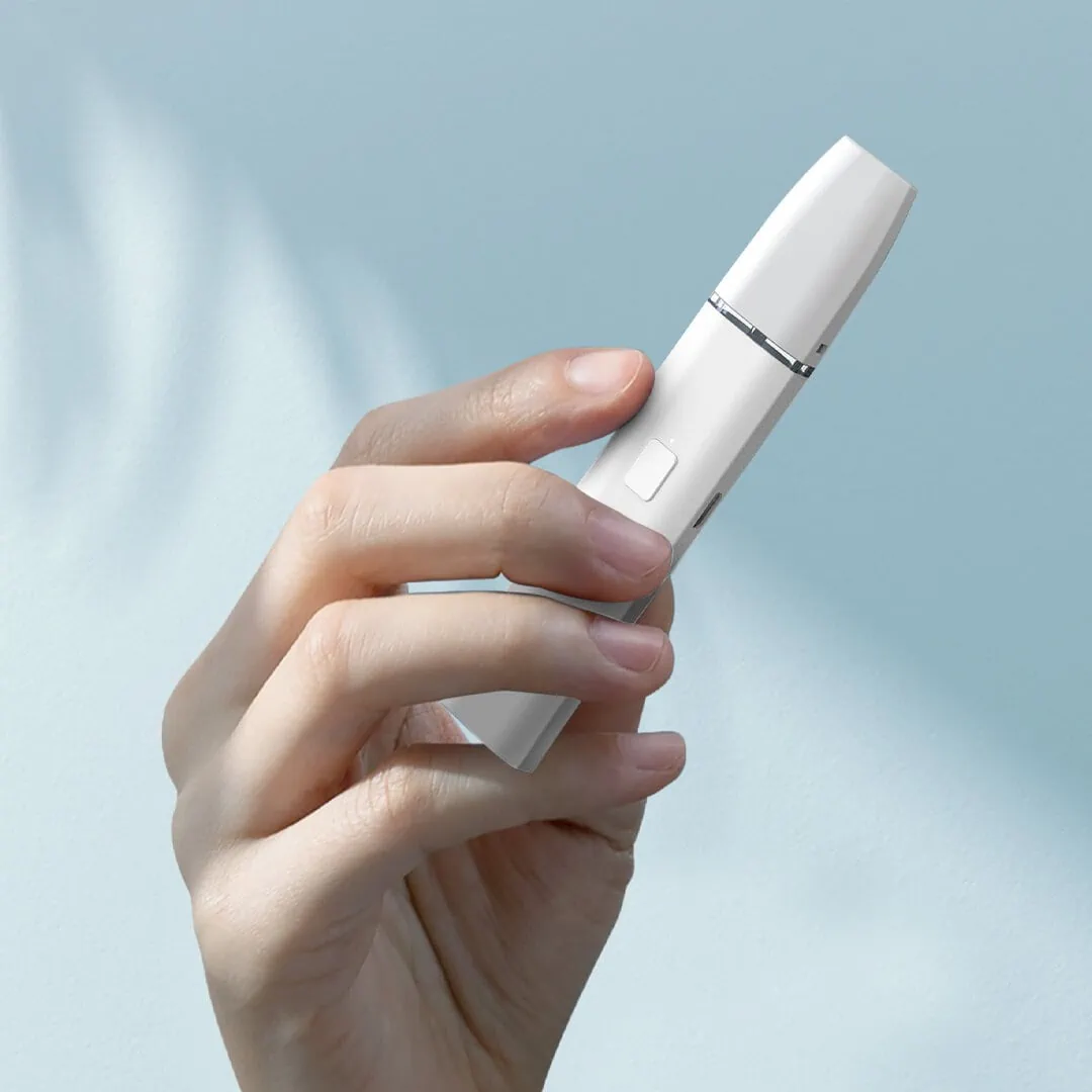 A woman's hand holding a Delta 8 Vape "Blue Dream" 2 Gram electric toothbrush.